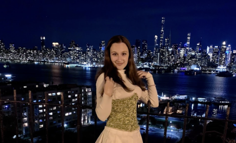 Hannah Steinlauf 22 after seeing Hamilton on Broadway, at the New York City skyline.