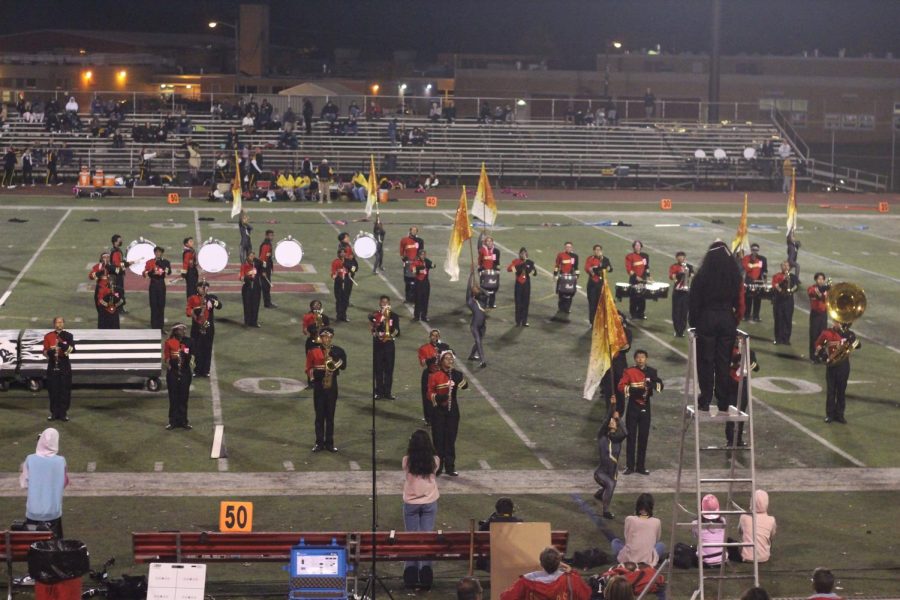 The Edison marching band performs their show Chaos Order at halftime.