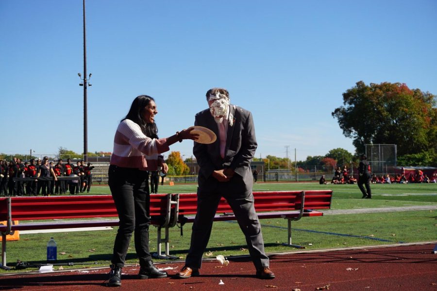 Mr. Ross being pied in the face by Swathi Srinivasan 23