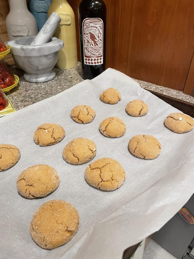 A batch of the Swedish spice cookie pepparkakor cools on the counter.