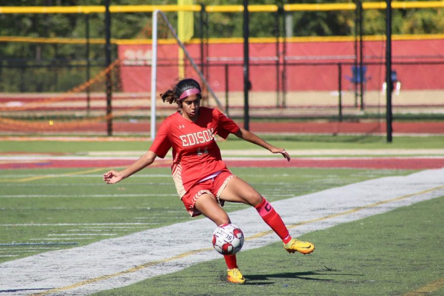 Shraddha Vemuri ‘23 in possession of the ball makes an effort to clear the ball from Edison’s side goal.