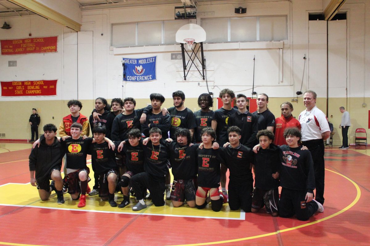 The EHS wrestling team poses together in the small gym.