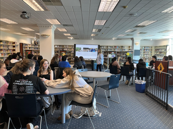 After being split into three sections, the third group of competitors eagerly wait for the competition to begin, at the alternative library in the Passaic County Technical Institute.