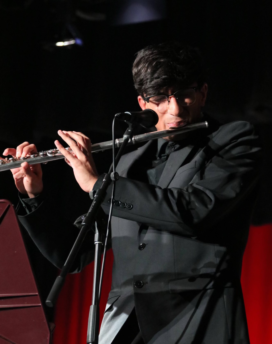 Standing tall, Khatri plays at the High School Jazz Festival.
