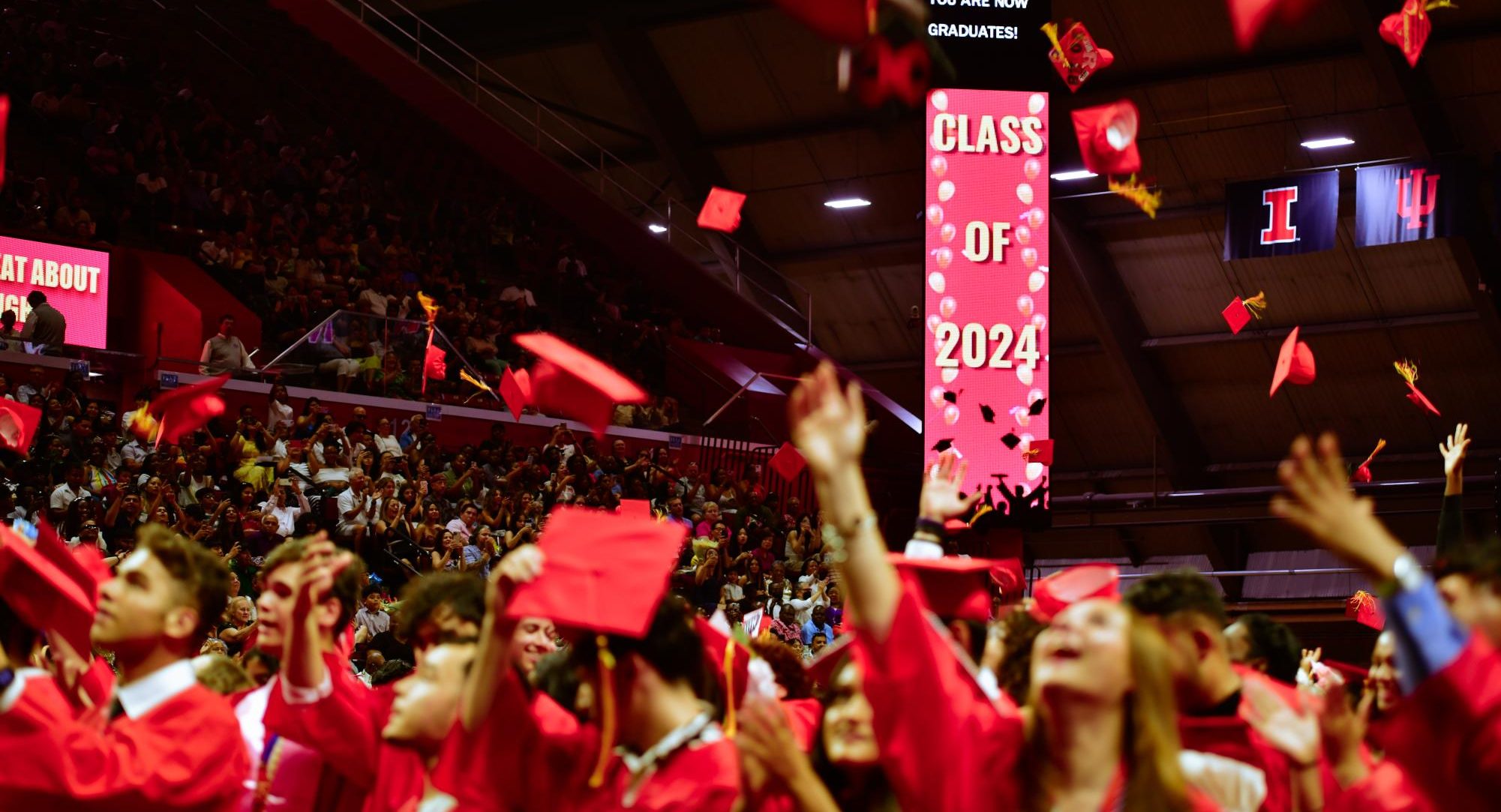 Edison High School's Class of 2024 throws their graduation caps in unison to mark that they are officially graduates.