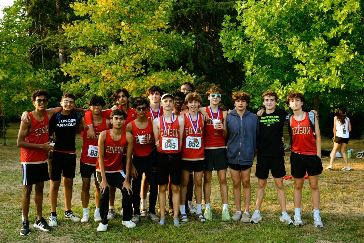 The Edison Boys Cross Country team poses for a team picture after their respective races.