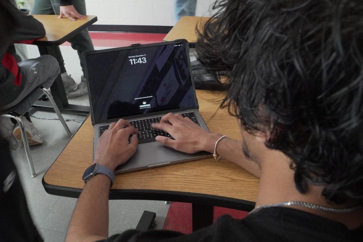 Aayush Chhabra '27 logs into his computer during class. With new MacBooks, students are now encountering another surprise: new limitations on their browsers.