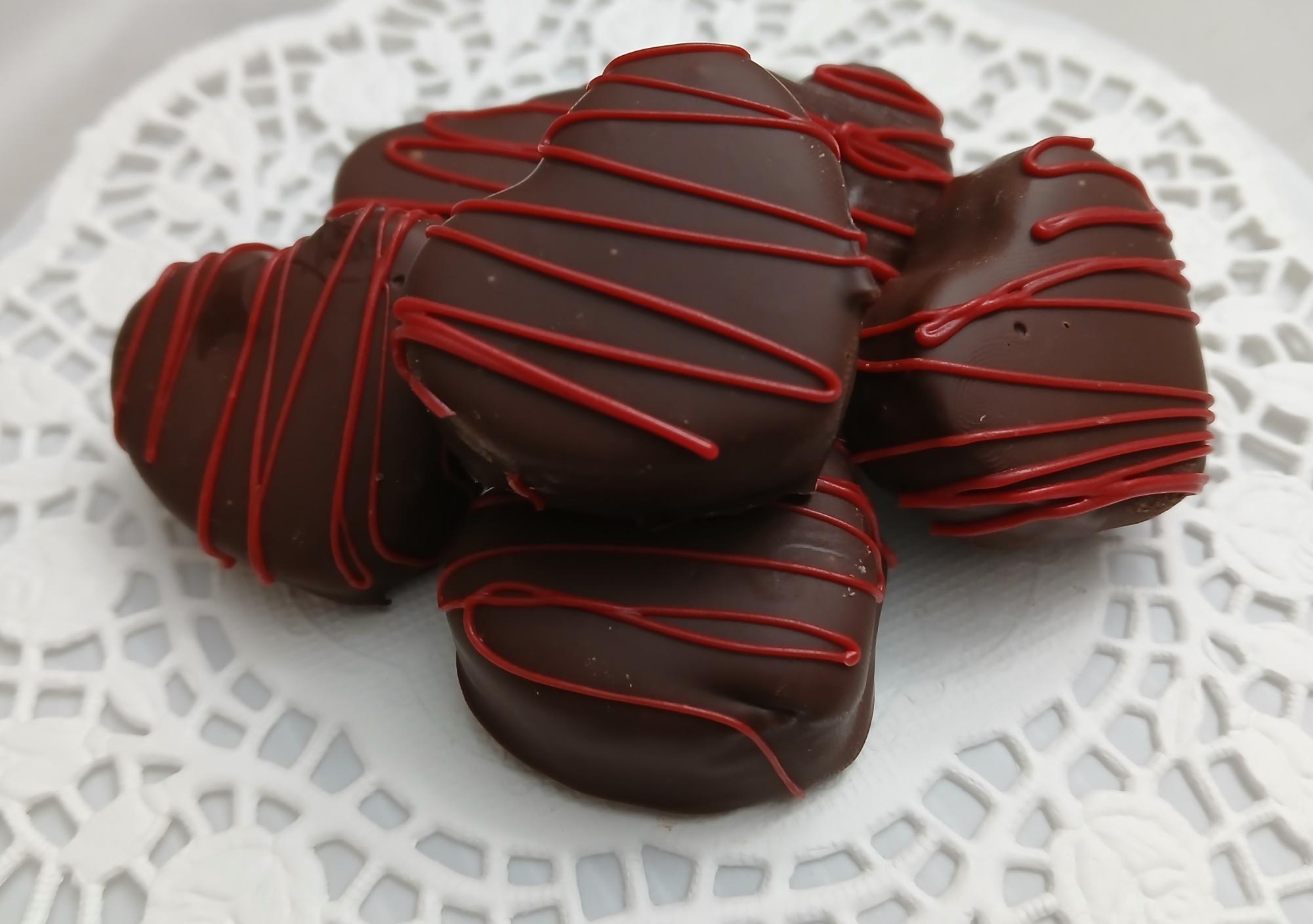 The finished chocolate strawberry truffles are ready to be served.