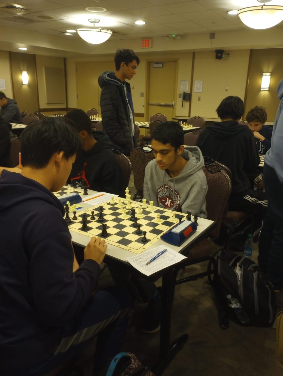 The tournament Director of Chess Club, Shreeram Ramabhadran '26, focuses during a game.