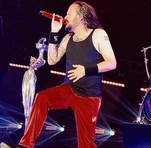 Jonathan Davis sings "Make Me Bad" while rocking his signature Adidas track pants.