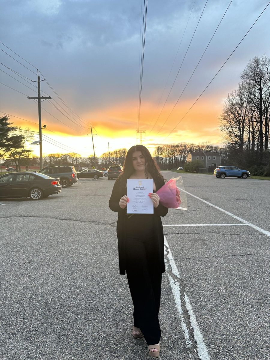 Micaelynne Correia '25, Rotary's February Senior of the Month, poses after the National Honors Society Inductions.