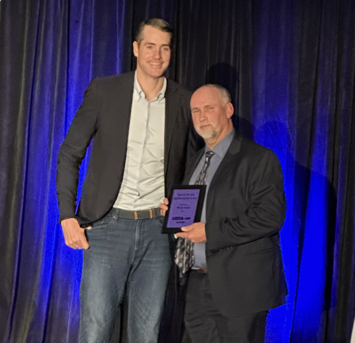 A special highlight from the award ceremony: tennis coach Mr. Wesley Smith meeting one of the U.S's leading tennis players, John Isner.