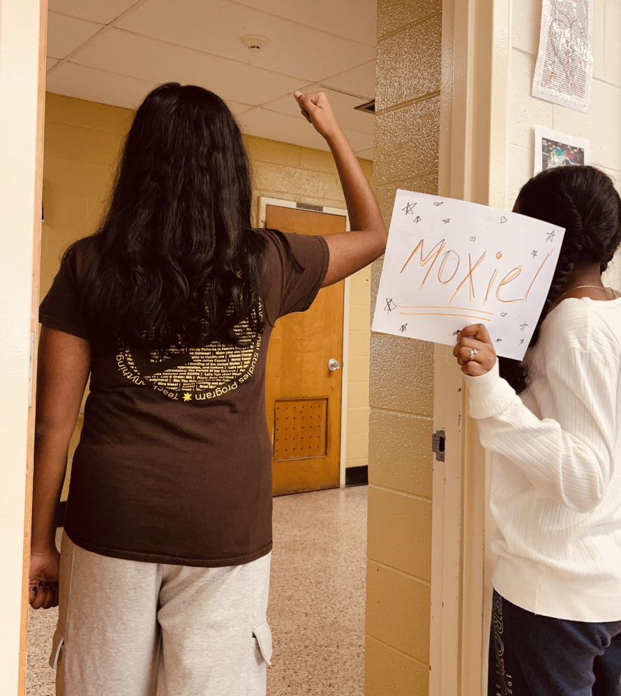 Rithika Gunasekaran '27 and Solai Ramasubramaniyam '27 reenact the walkout from the novel Moxie in support of girl power.