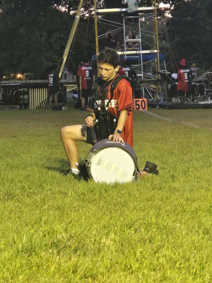 Rotary's June Senior of the Month: Juan Mora Herrera '25 wears the 2024 EHS Percussion Jersey at Band Camp.
