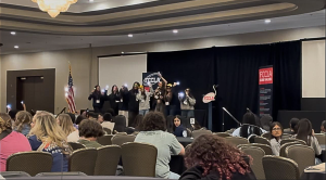 Students from Edison High School participate in a lively karaoke session during "Fun Night" at the FCCLA State Leadership Conference, held in the banquet hall to encourage student engagement and connection. 