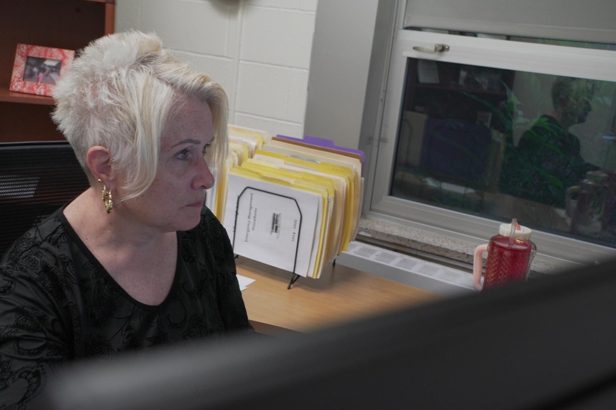 EHS school counseling supervisor Dr. Diane Braungard-Galayda works at her desk in the morning. After 13 years of service to the EHS community, she stresses following passions and finding new learning experiences.