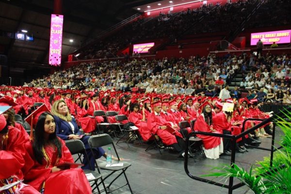 Edison High’s Class of 2025 look on as their commencement ceremony begins.