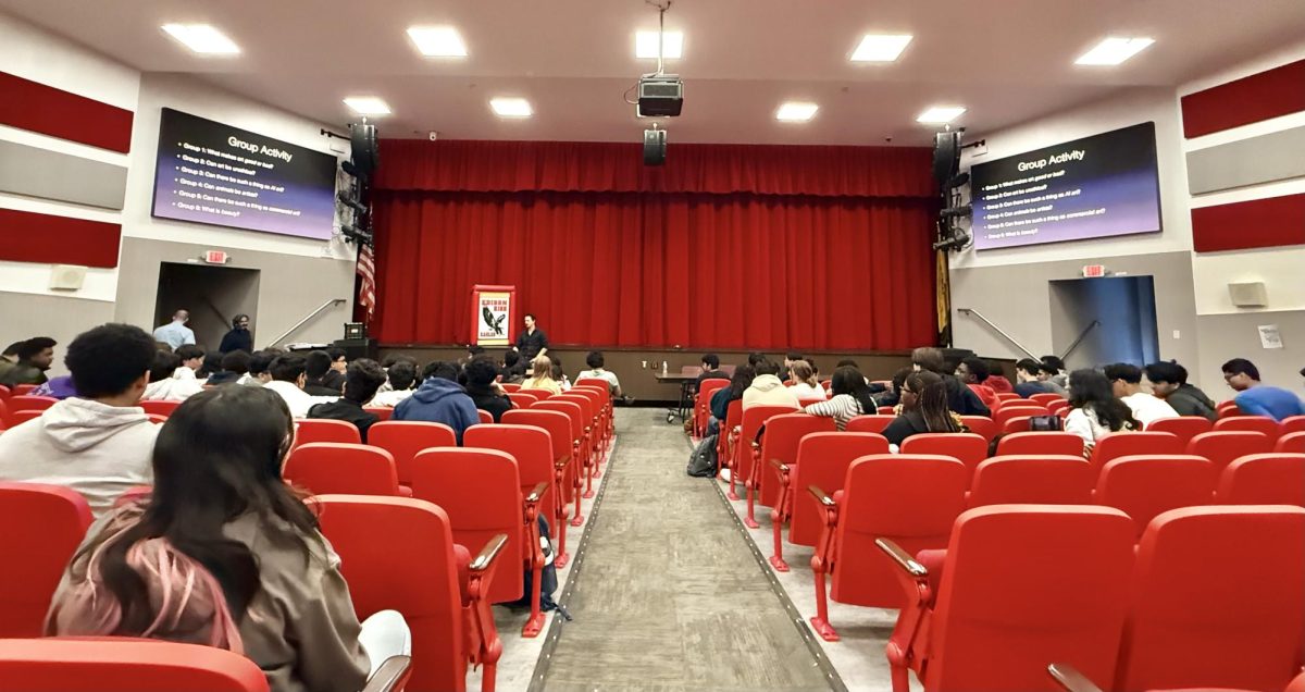 Professor Celi engages students in a group activity, challenging them to formulate precise answers to diverse questions while maintaining a broad range of perspectives.
