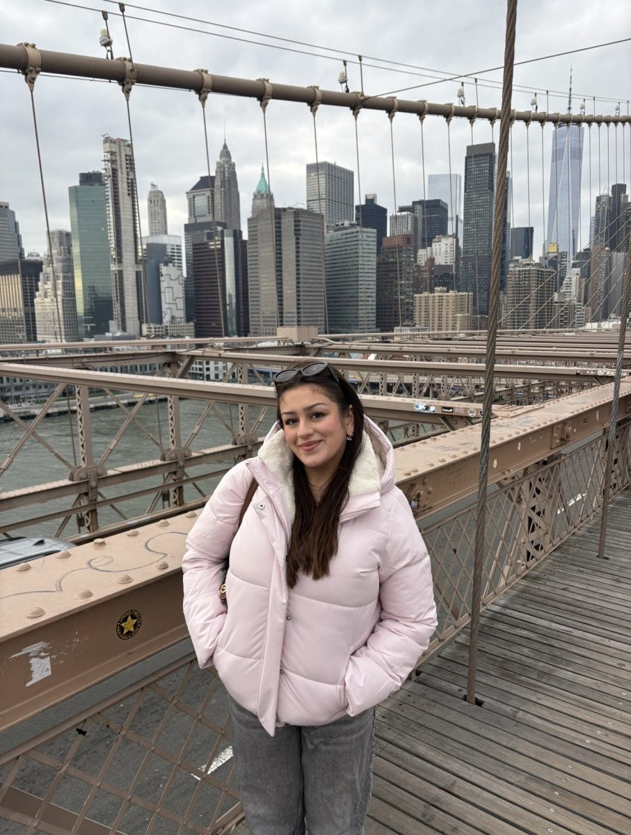 Rotary’s January Senior of the Month Zeynep Kacan ‘26 poses on the Brooklyn Bridge with the Manhattan skyline in the background. She encourages students not to measure their success through comparison.