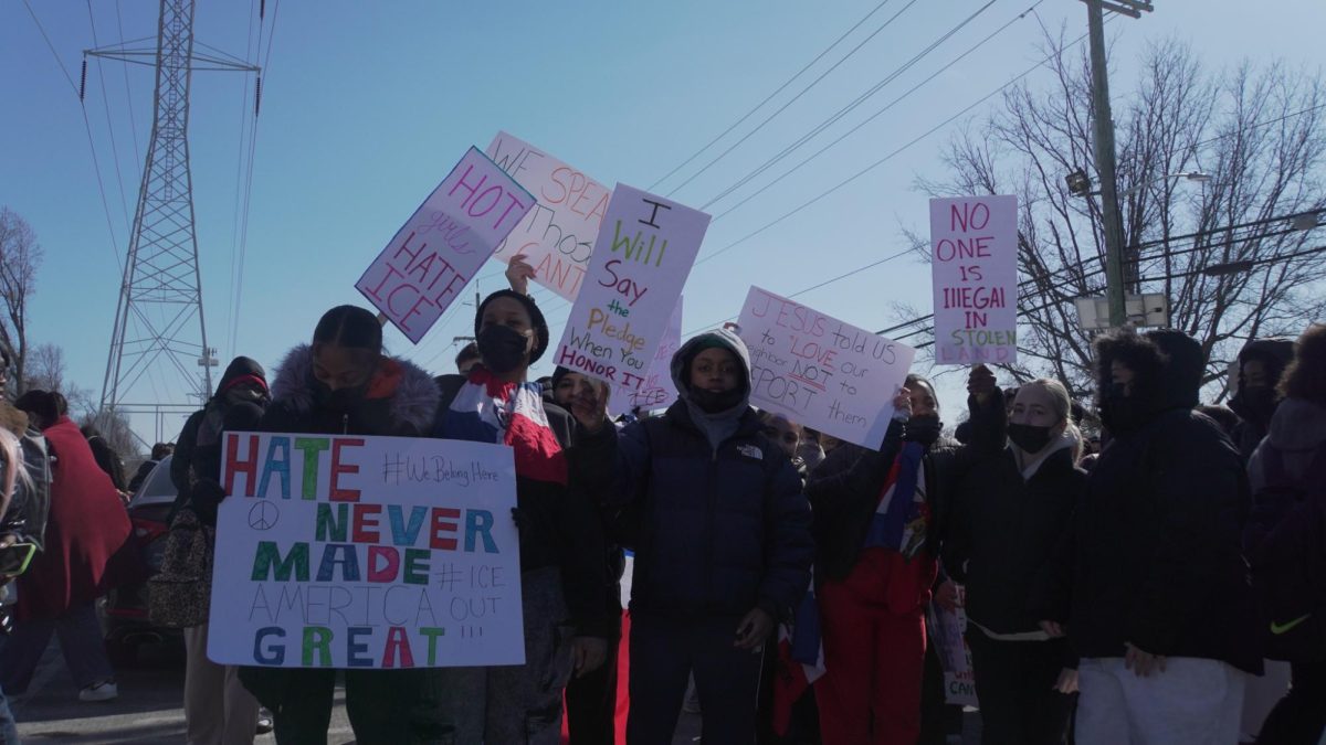 Student protestors gather in the senior lot, following the conclusion of the day's classes.