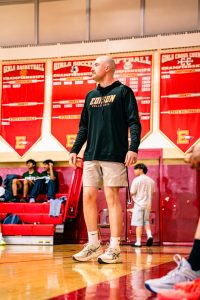 Boys Volleyball Coach Mr. Jason Wernlund observes his team during practice. With a focus on intensity and preparation, the program continues to build through hard work and a competitive mindset.