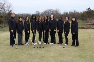 Coach Frank Juliano (left) poses with Edison golfers Jaishri Raj '28, Lily Perry '28, Sai Narindi '27, Katie Hahn '26, Aashi Tamboli '26, Kalina Petrova '27, Sai Chandran '28, Irene Choe '27, and Suri Neoh '28. The team has started its season strong with three back-to-back wins.