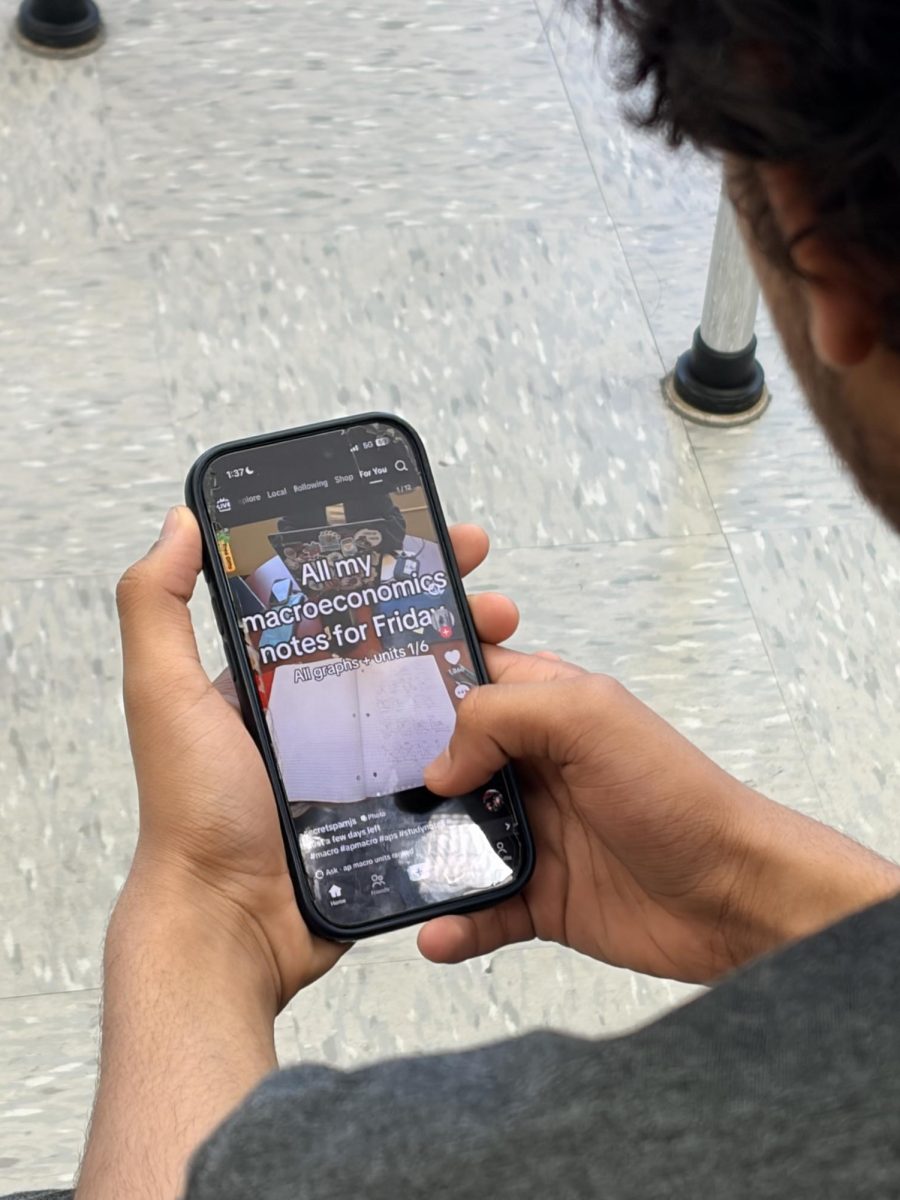 A user scrolls through TikTok as debate over the app’s national security implications continues.