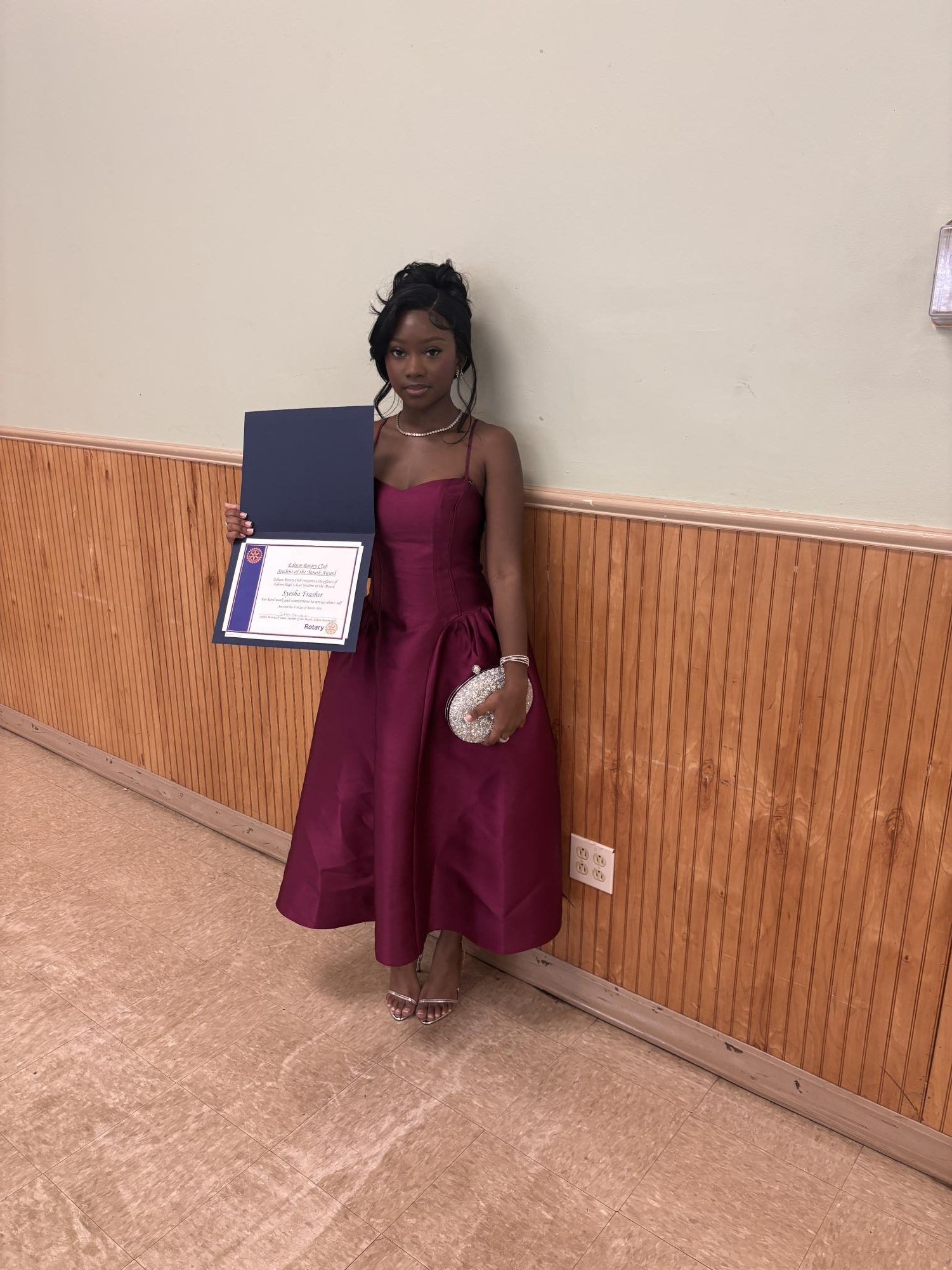 Syesha Fraser ‘26 poses with her award, noting that serving as Class President was the most meaningful leadership role of her time at Edison High.
