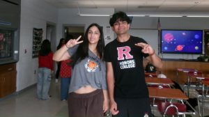 Valedictorian Ishani Bakshi '26 (left) and Salutatorian Hrishi Shah '26 pose in their college gear, crediting their academic success to hands-on learning and proactive study habits.